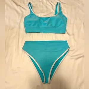 LainSnow Women’s Kiawah bikini top and bottom, color sea, size XL.
